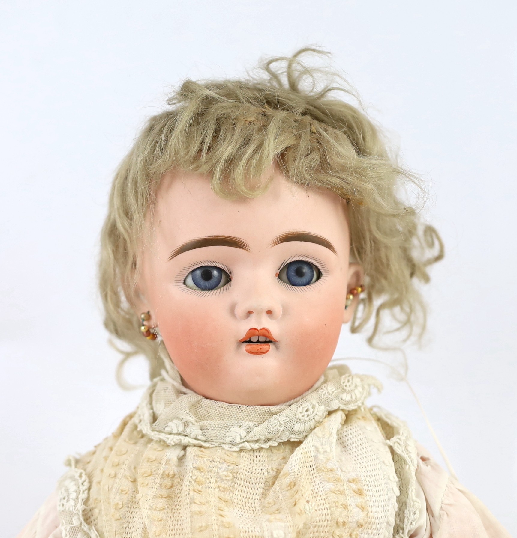 An Adolf Wislizenus bisque doll, German, circa 1910, 24in.